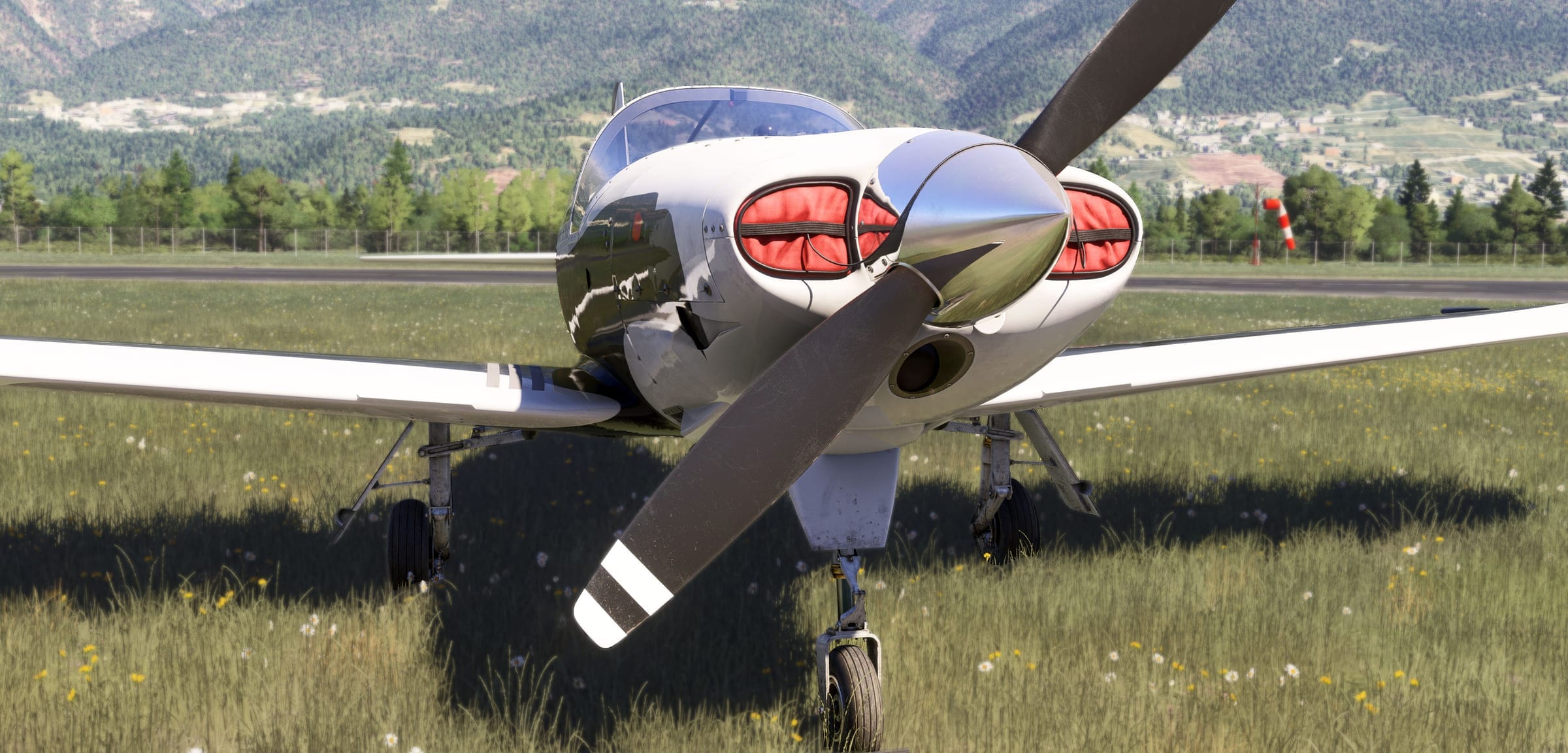 Falco F8L on a wet airfield at dusk